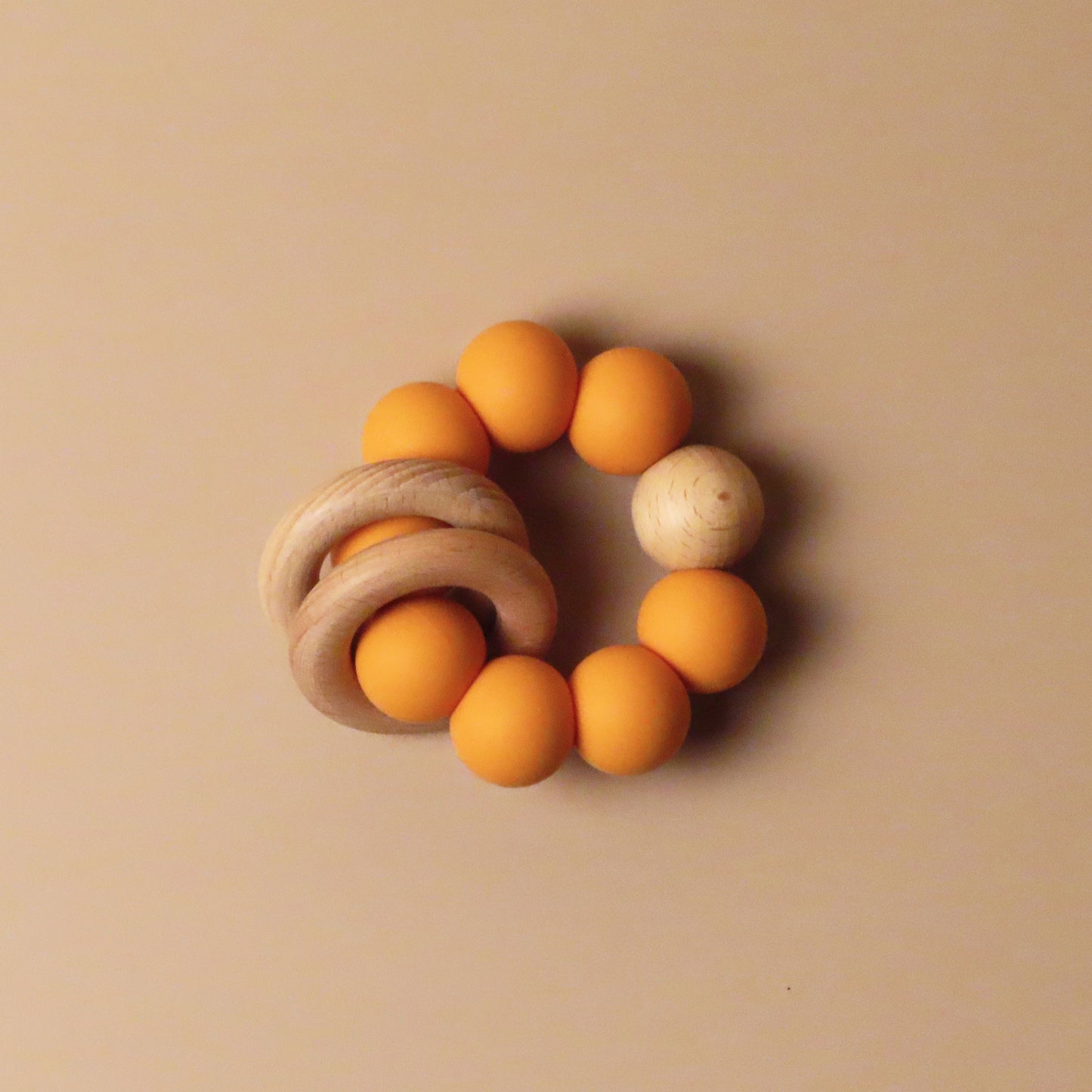 baby silicone and wooden teether beads orange