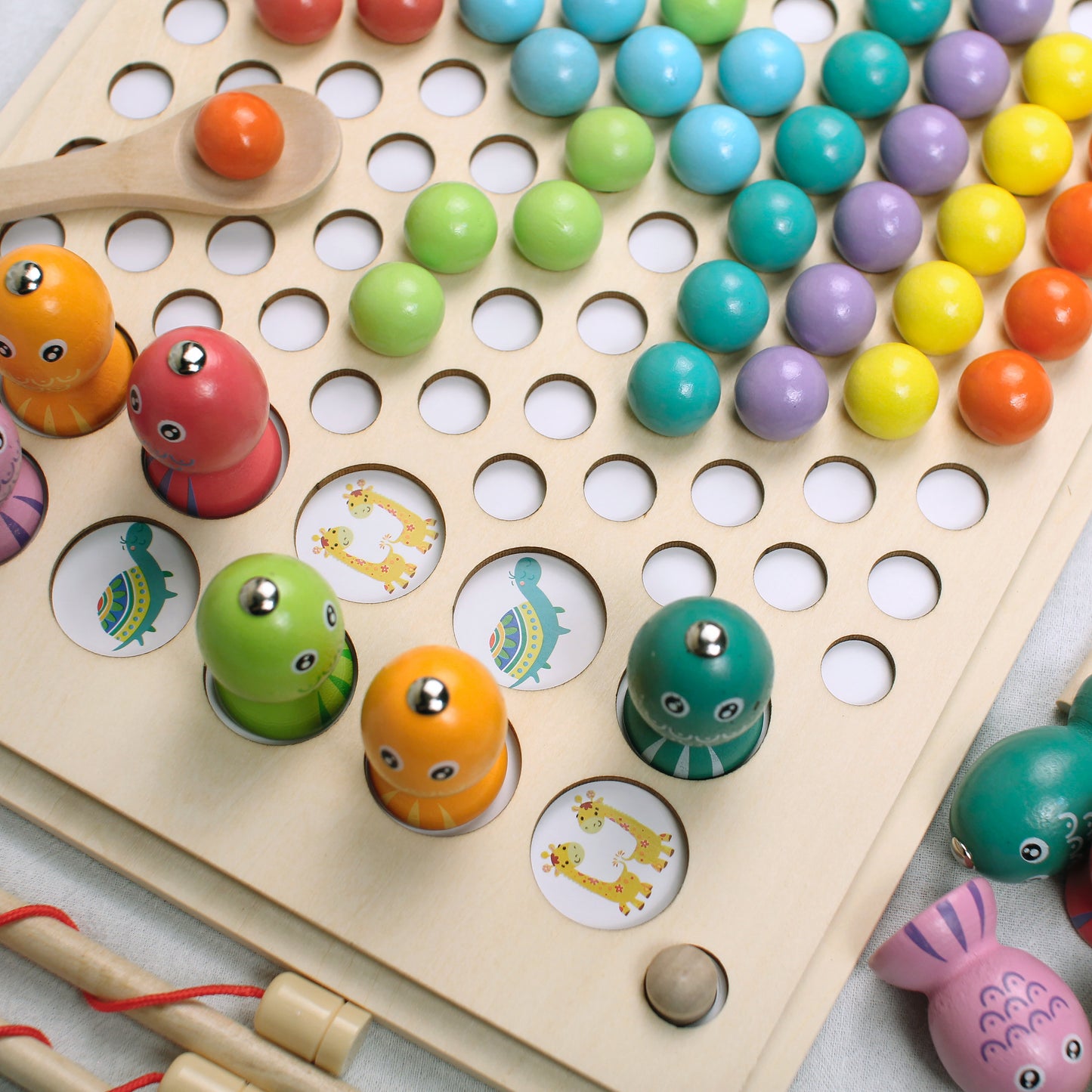creating picture with colourful wooden balls sorting game and colourful wooden fishes fishing memory game