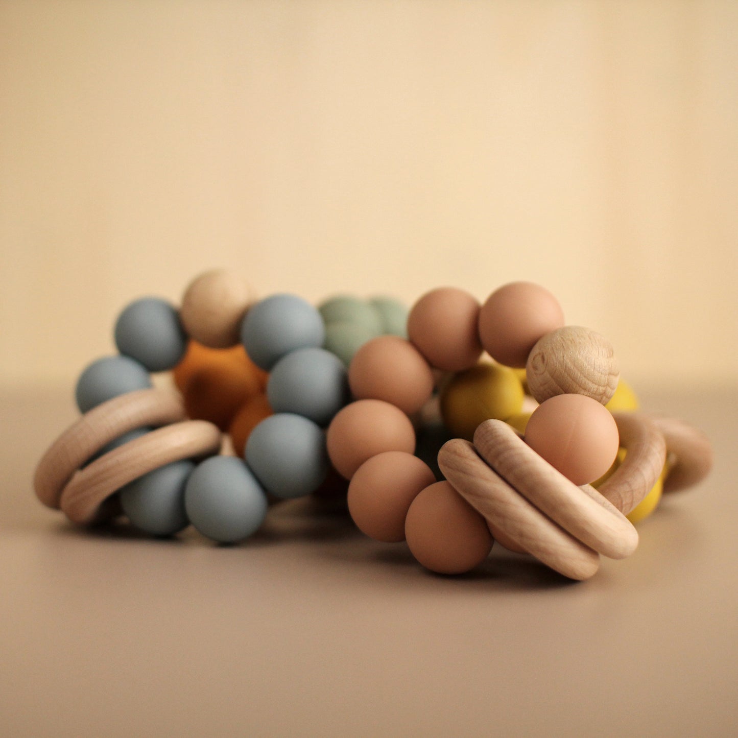 baby silicone and wooden teether beads mustard yellow, leaf green, aqua blue, orange, beige