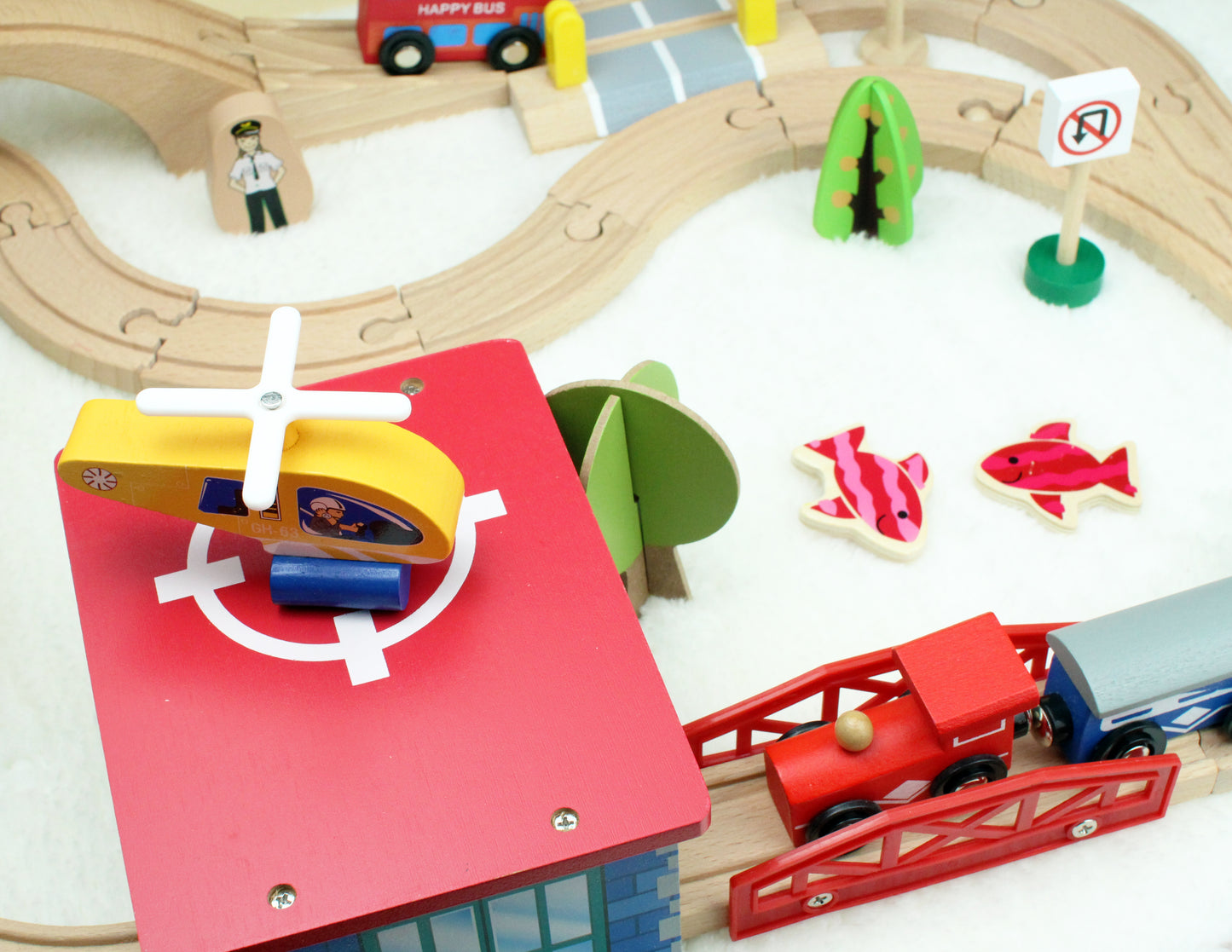 wooden train (station) toy set with bus, helicopter, trees, fishing, traffic lights