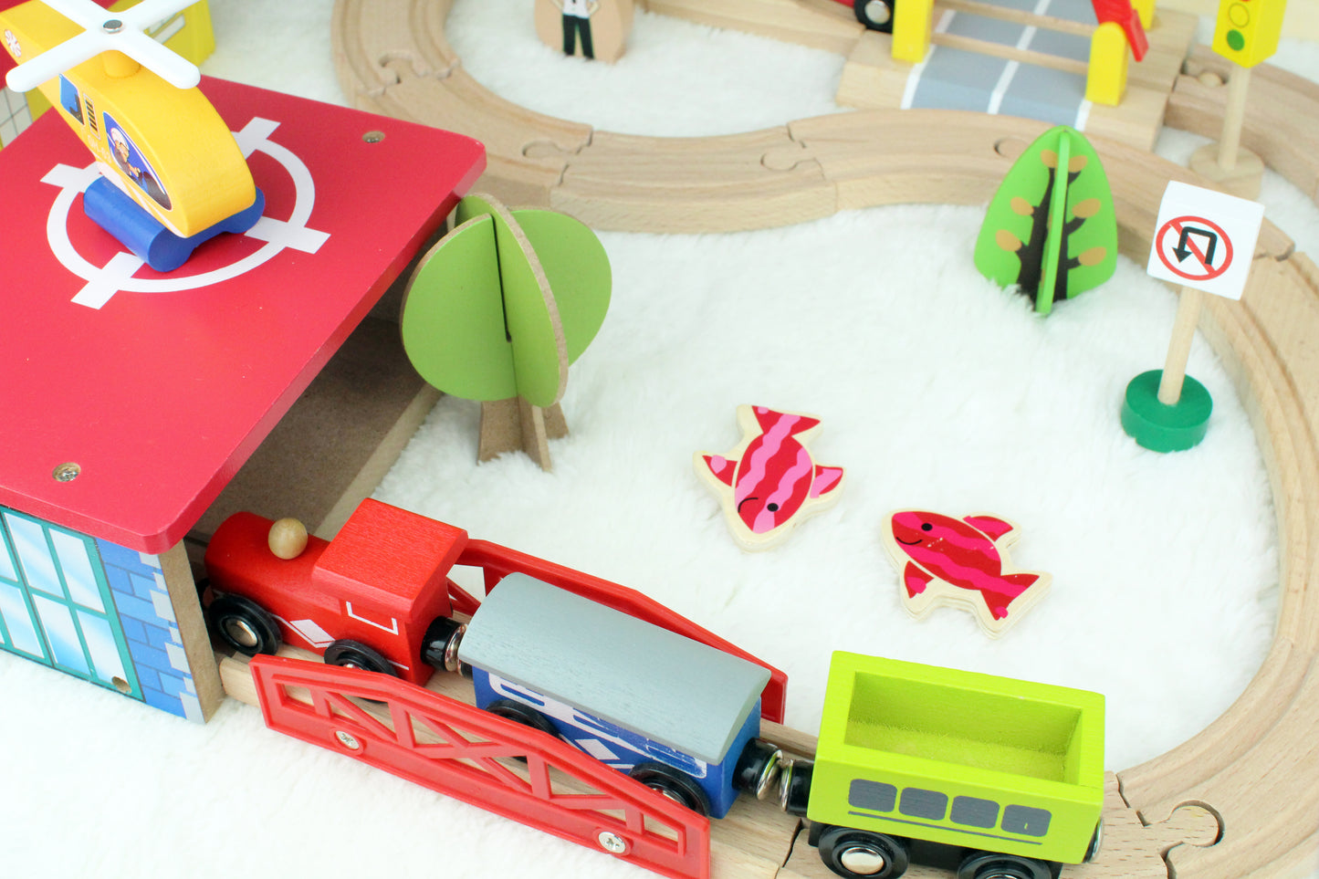 wooden train (station) toy set with bus, helicopter, trees, fishing, traffic lights